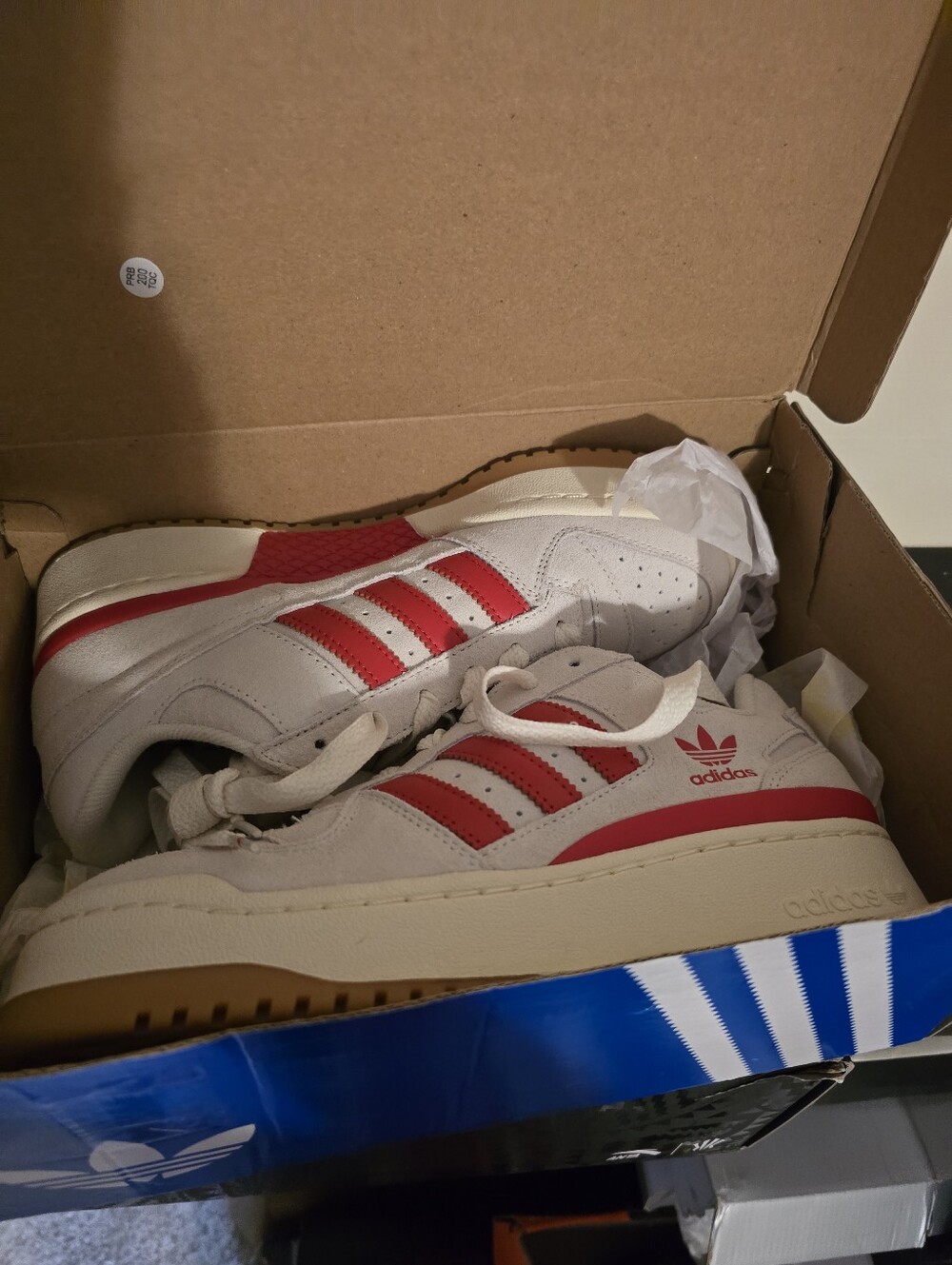 Adidas White Sneakers with Red Stripes and Gum Sole